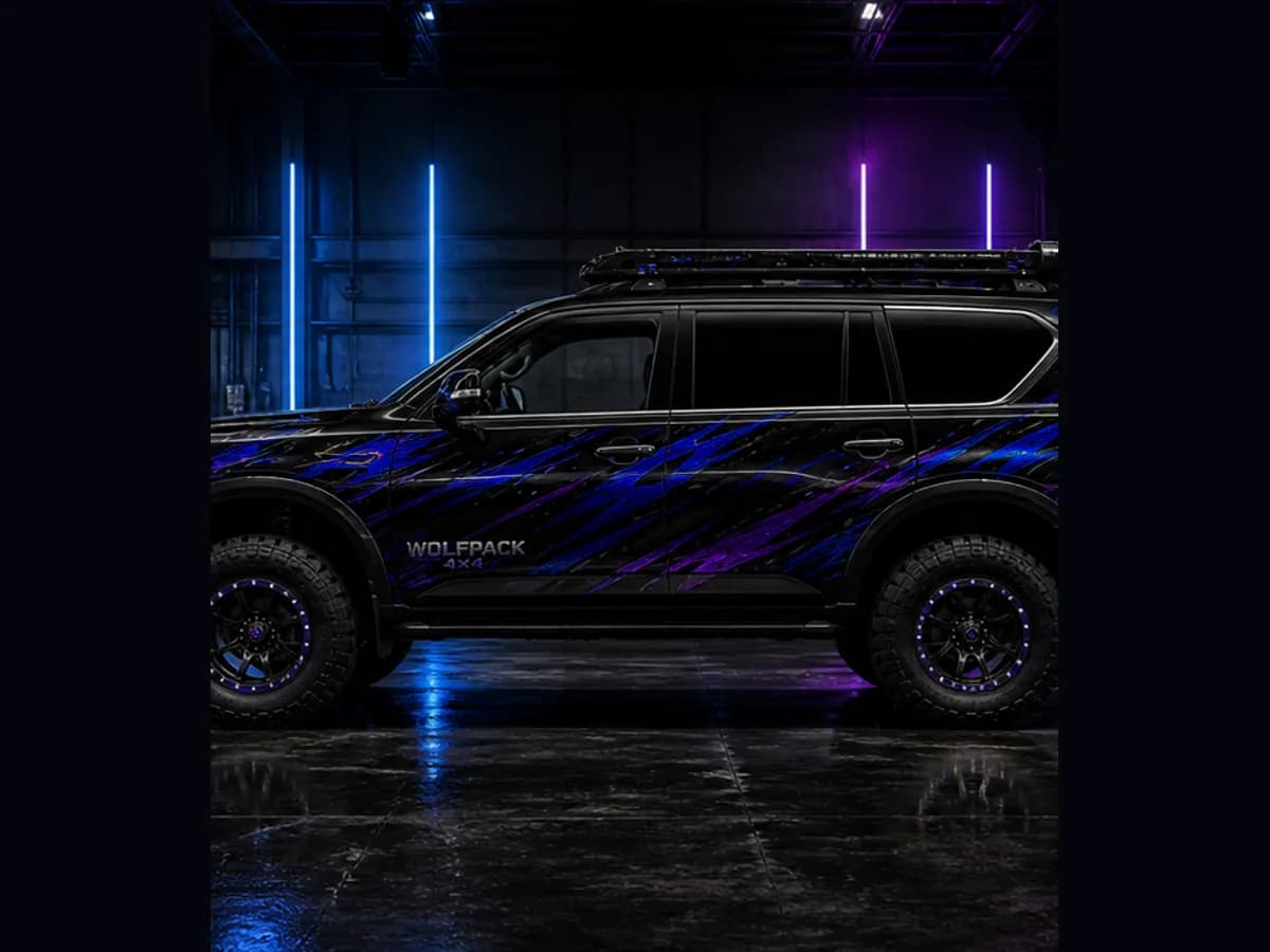 Side view of a Nissan Patrol Warrior with Wolfpack wrap