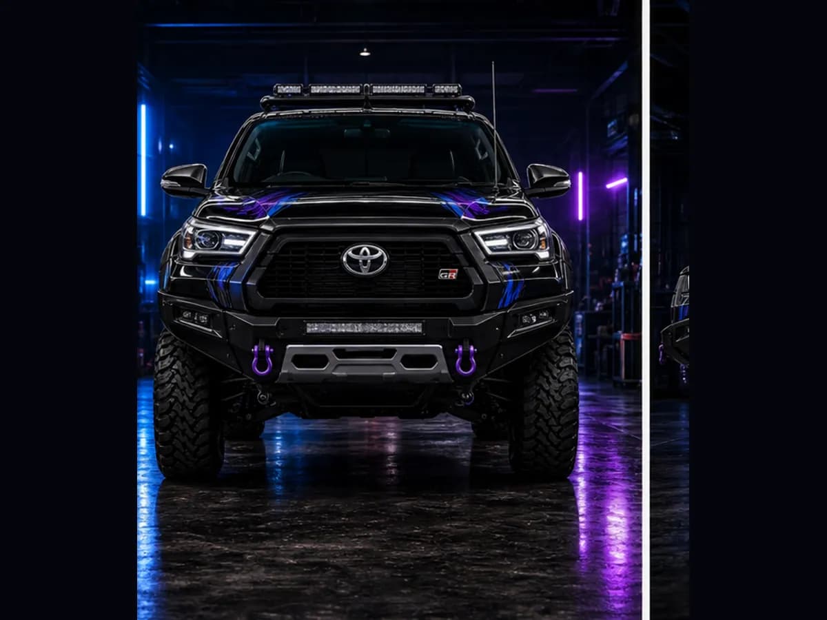 Front view of a Toyota HiLux GR Sport with Toyota badge and Wolfpack wrap